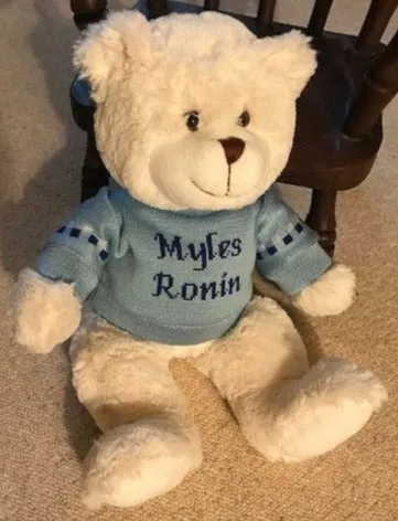Teddy bear with personalized sweater